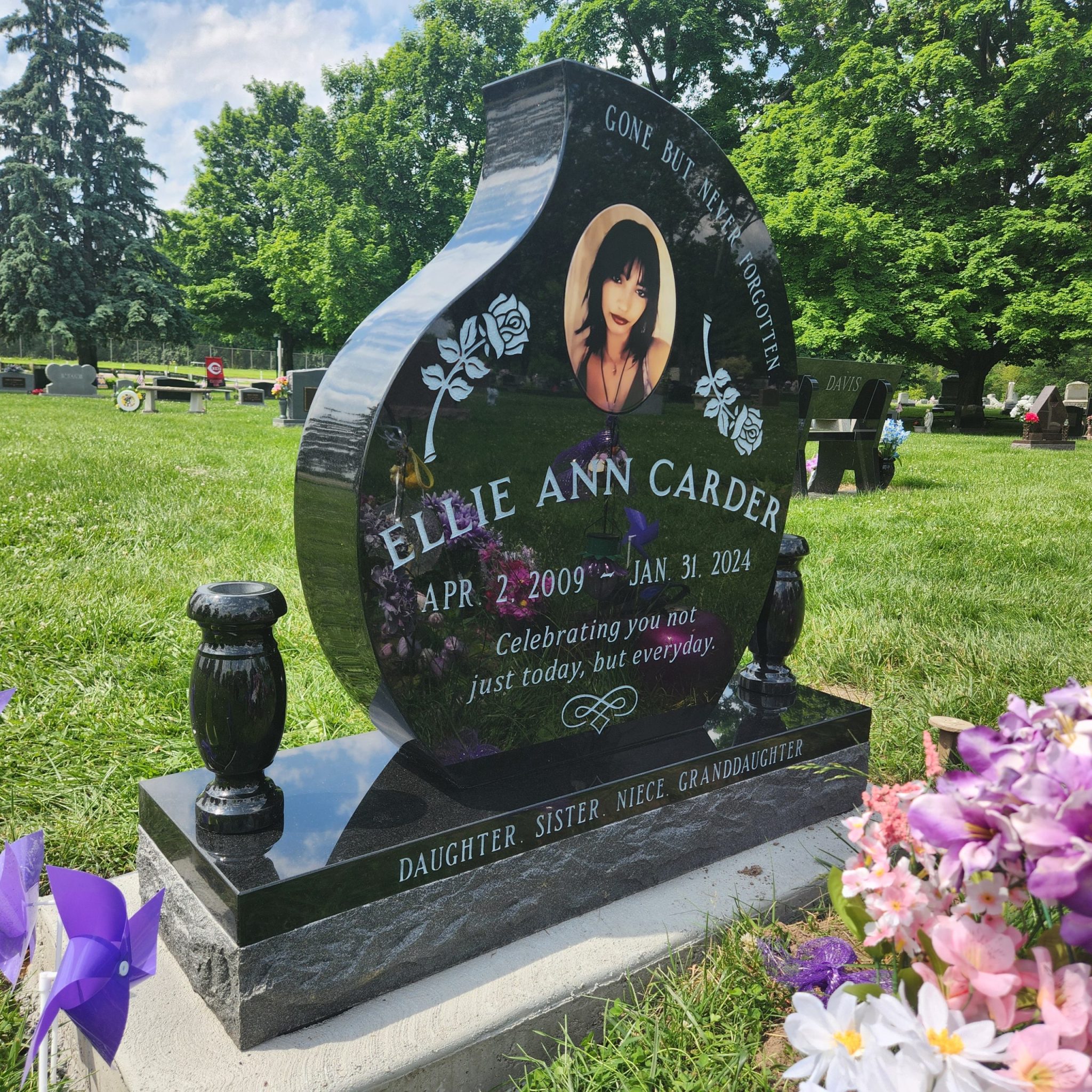 Custom-shaped memorial crafted from premium granite by Stoltz Memorials in Blanchester