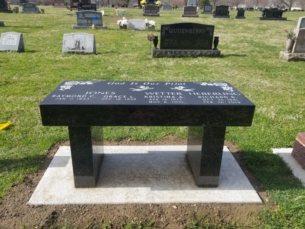 Companion granite memorial bench seat with dual engravings, providing a peaceful and lasting tribute for two loved ones.