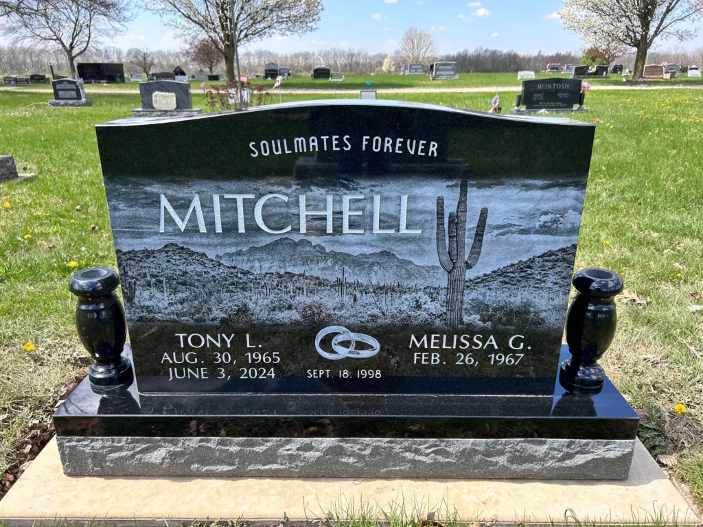 Companion upright granite monument with two engraved name panels, standing as a strong and timeless tribute to loved ones remembered together