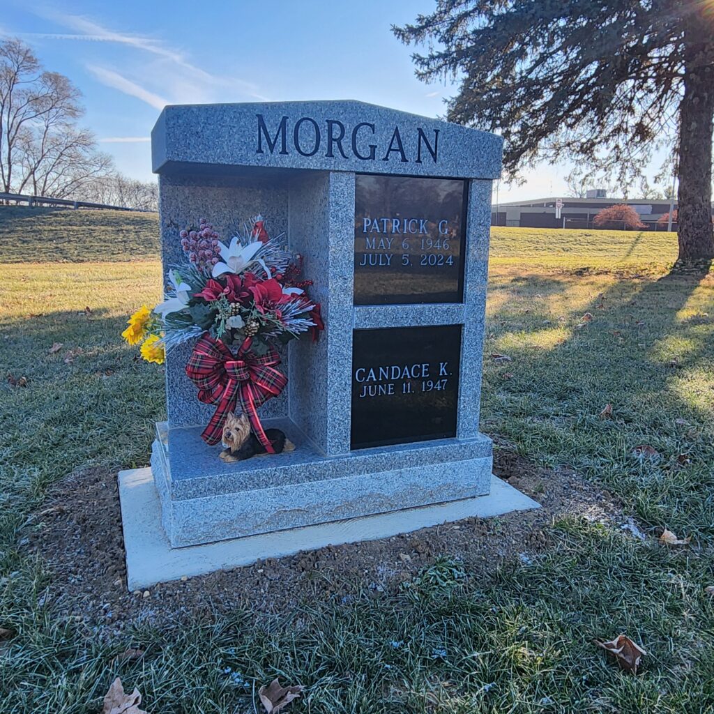 Two-niche cremation columbarium with alcove design in polished granite, offering side-by-side spaces for dual urn placement and personalized engravings.