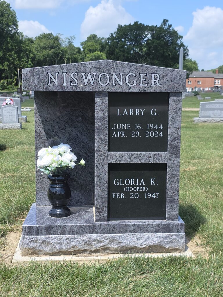 Two-niche cremation columbarium with alcove design in polished granite, featuring space for dual urn placements and personalized engraving.
