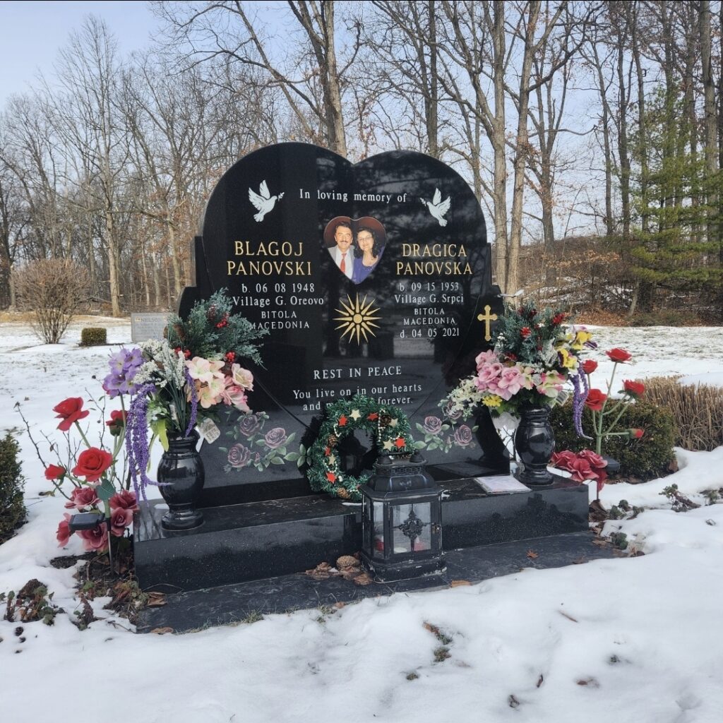 Companion upright granite monument with dual inscription panels, offering a traditional and enduring tribute to two loved ones remembered together.