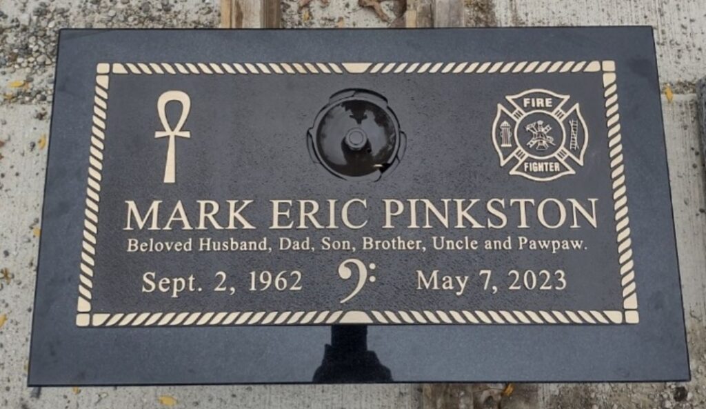 Single bronze memorial marker mounted on a polished granite base, featuring custom engraving and a refined, lasting design.
