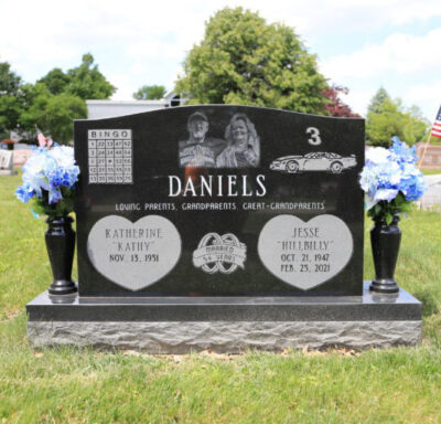 A custom companion slant headstone manufactured and installed by Stoltz Memorials in a local Ohio cemetery.